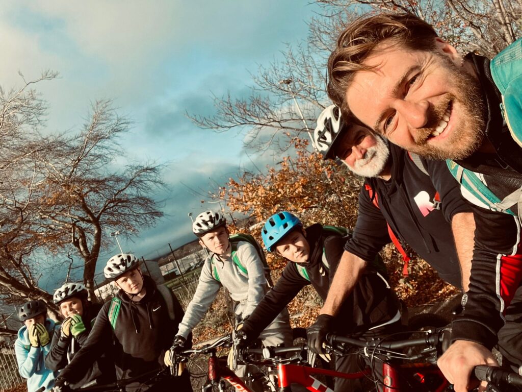 Group of people on bikes outside